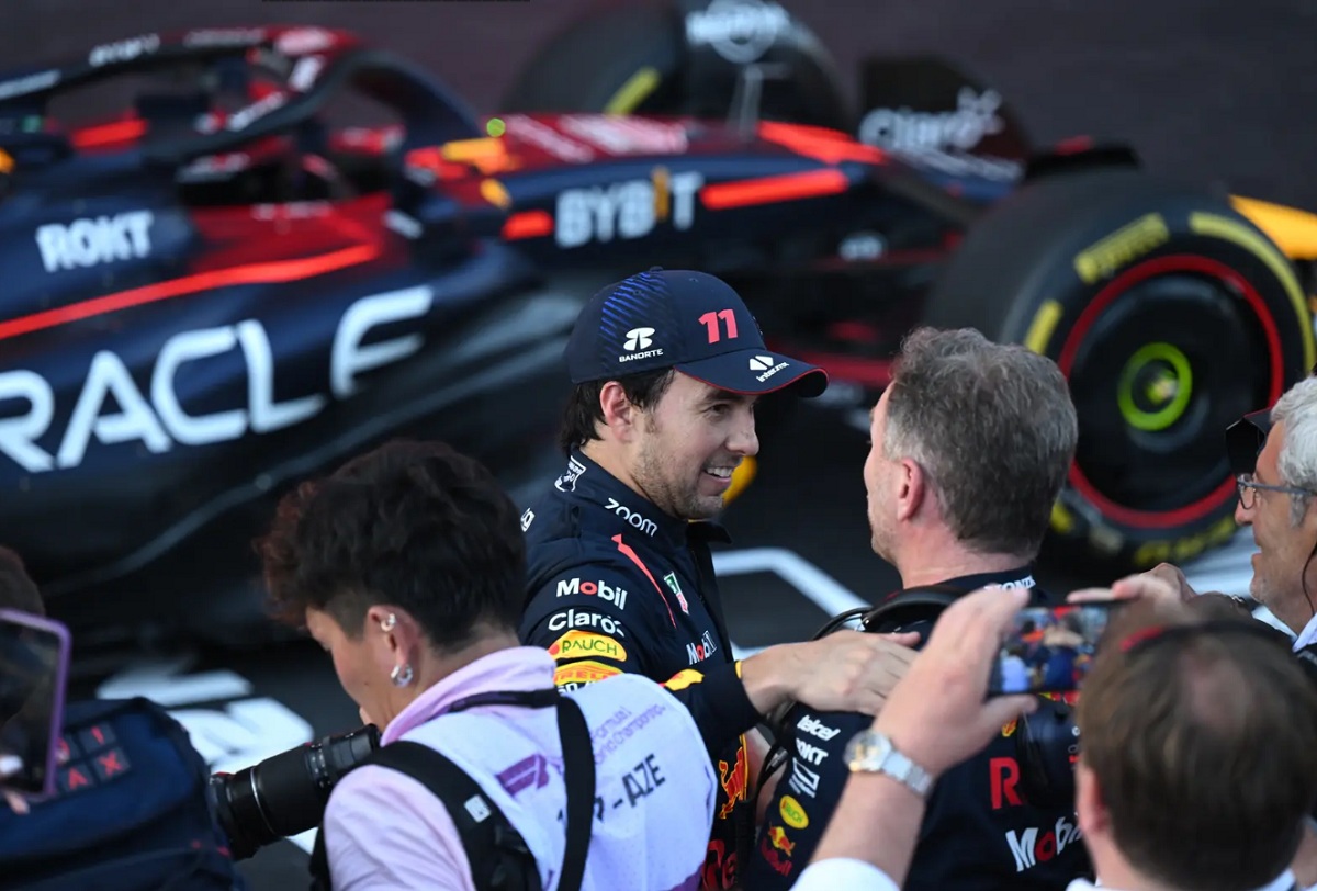 Pérez habla con Horner en el parque cerrado. (Simon Galloway)